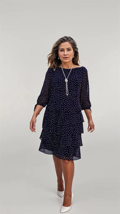 Deborah | Airy dress with polka dot print and pleated skirt